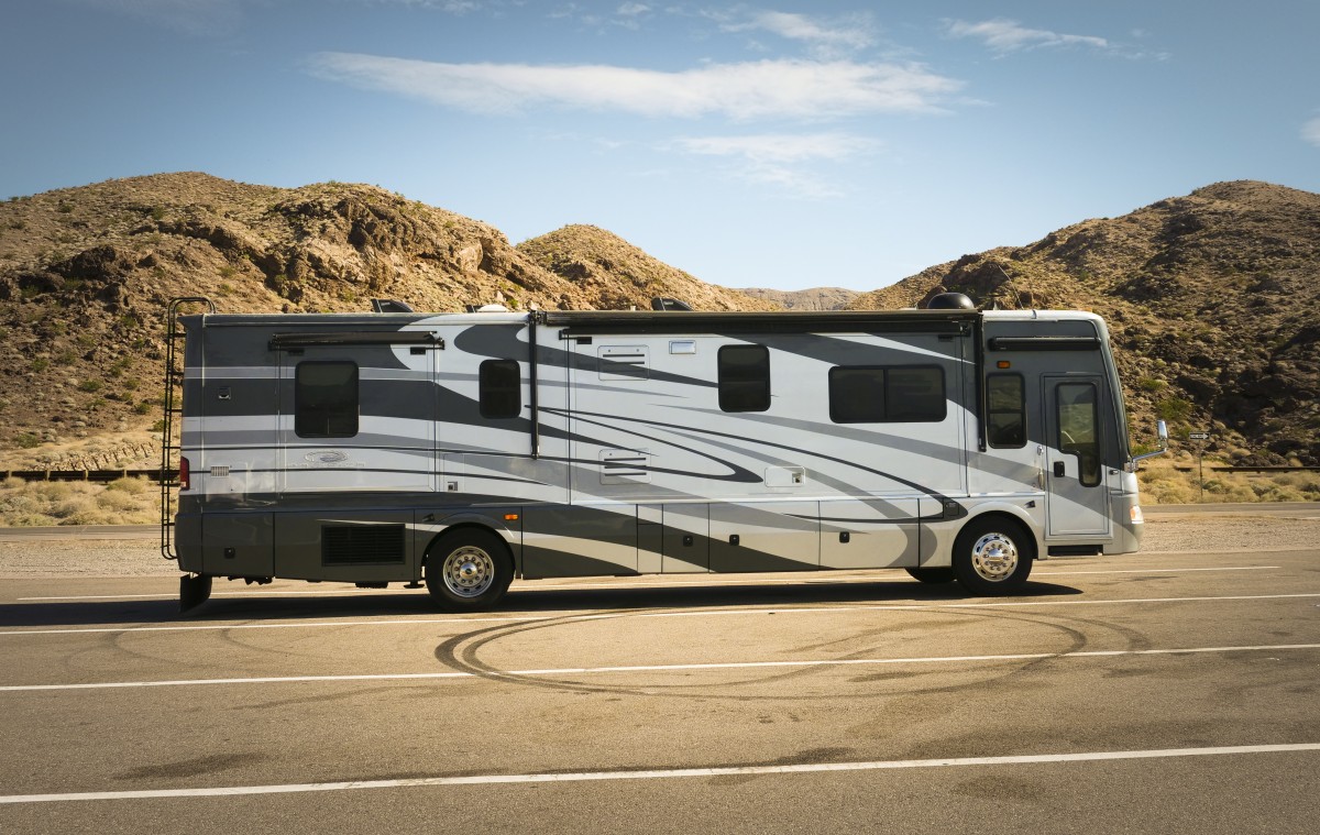 RV Driving on Road in the Desert